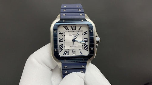 Cartier watch with blue dial, Roman numerals, and blue leather strap