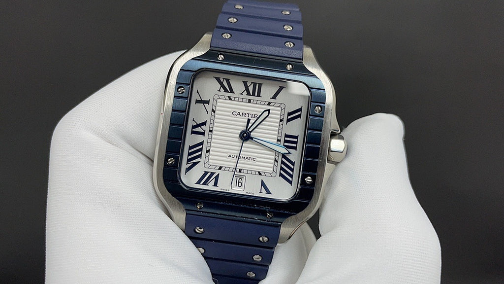 Cartier watch front view with blue dial, Roman numerals, and blue leather strap