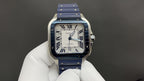 Cartier watch front view, blue dial with Roman numerals and blue leather strap