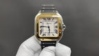 Gold-tone square wristwatch with black leather strap, Roman numeral dial