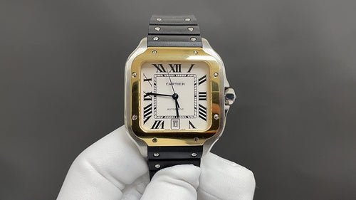 Gold-tone square wristwatch with black leather strap, Roman numeral dial