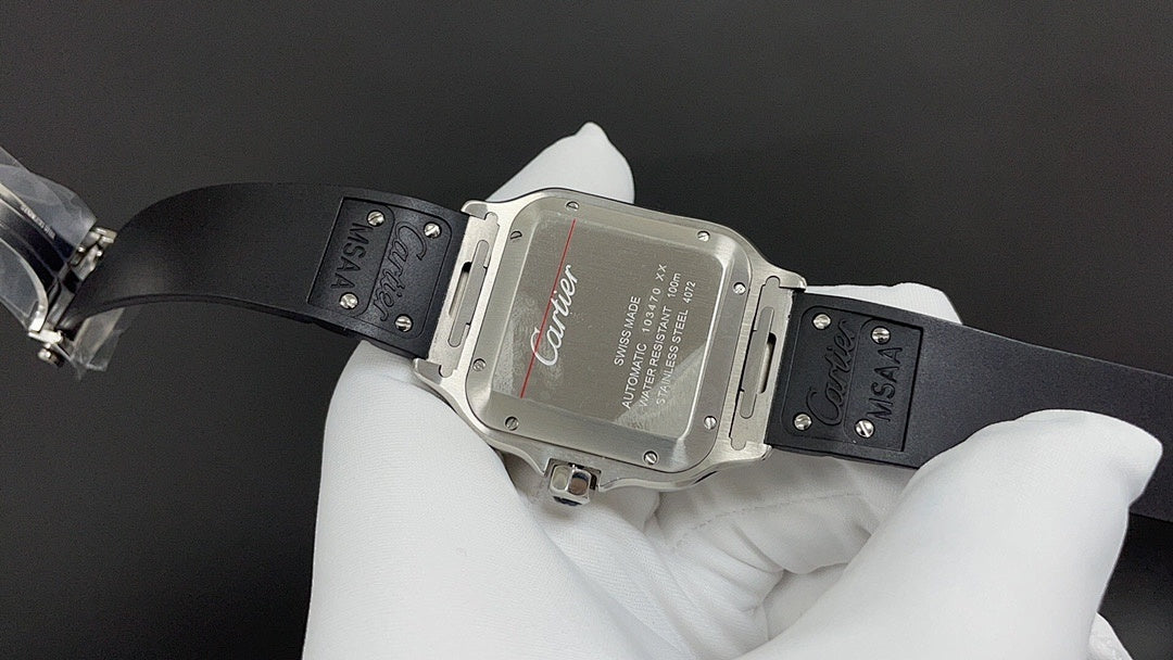 Silver-toned square wristwatch with black leather strap, clasp and red Cartier script