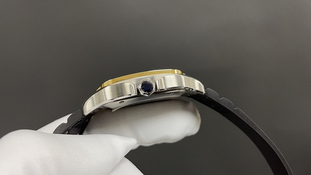 Metal watch case with crown detail and black leather strap