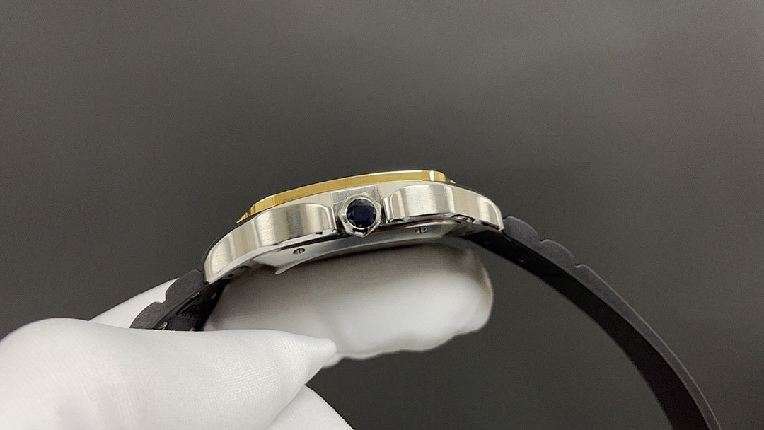 Metal watch case with crown detail and black leather strap