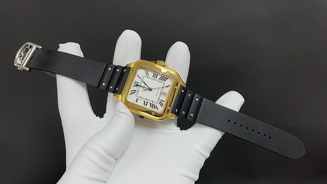 Gold watch on black leather strap, rectangular bezel, white dial with Roman numerals