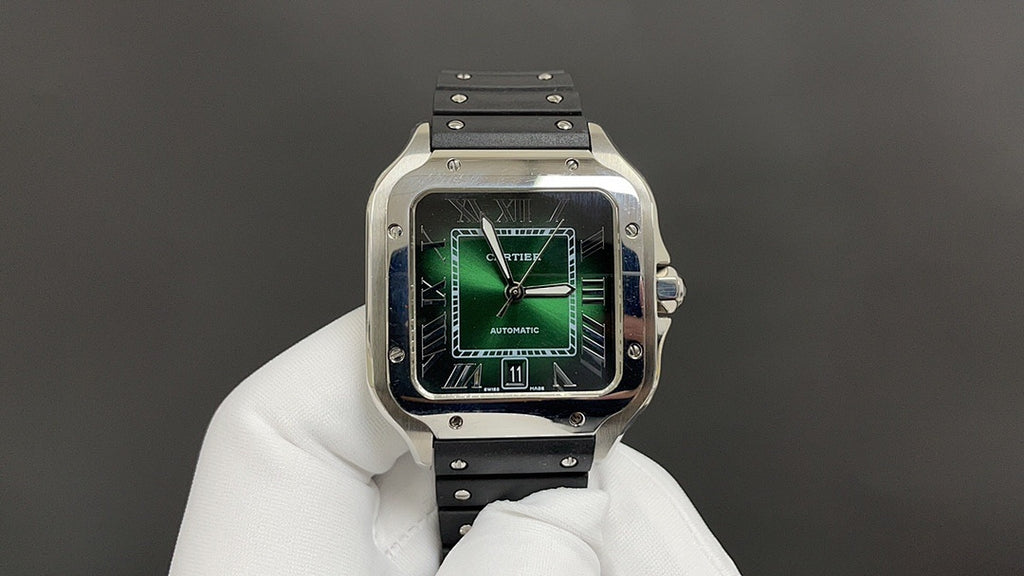 Cartier wristwatch with black rubber strap and silver case, green dial, baton markers