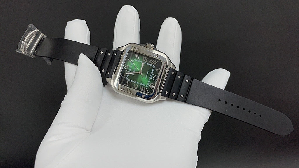 Cartier wristwatch on black rubber strap, square silver case with green dial