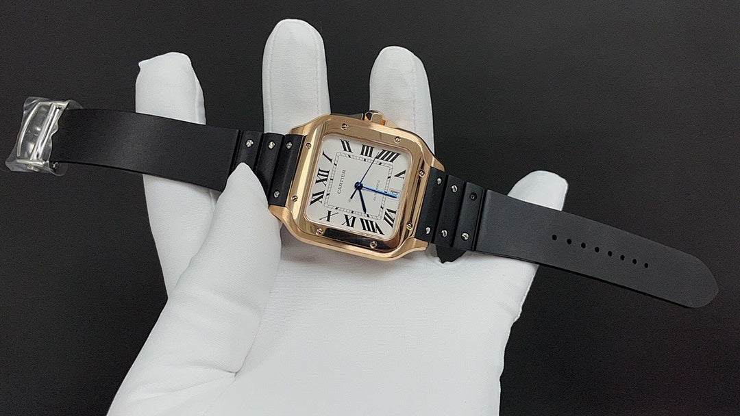 Cartier watch with black strap extended, held in white gloves