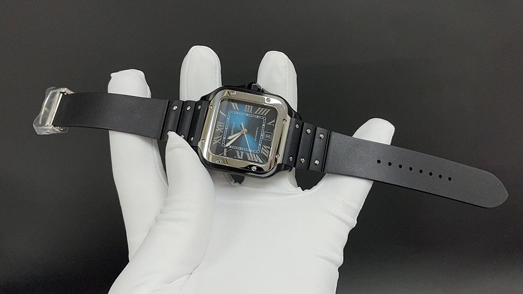 Cartier watch on wrist with black strap, blue dial visible in white gloves.