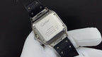 Cartier watch caseback with engraved silver back plate and black leather strap