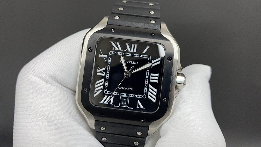 Men's Cartier watch with black Roman-numeral dial, steel case, and black leather strap