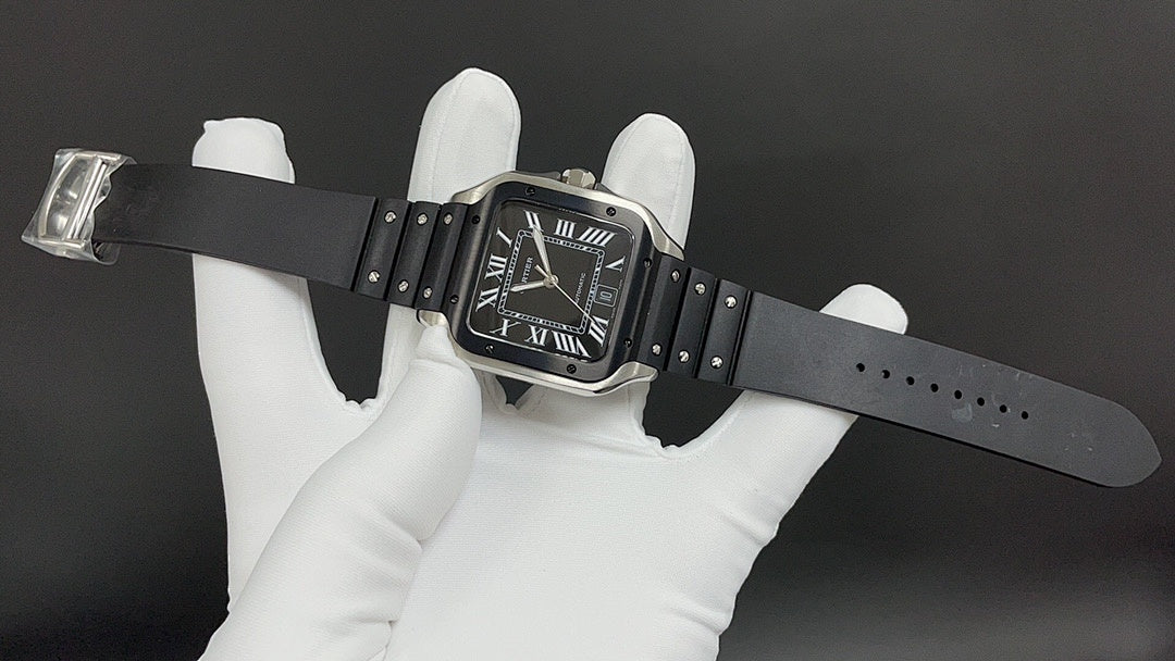 Cartier watch with black leather strap, steel case, and black Roman numeral dial