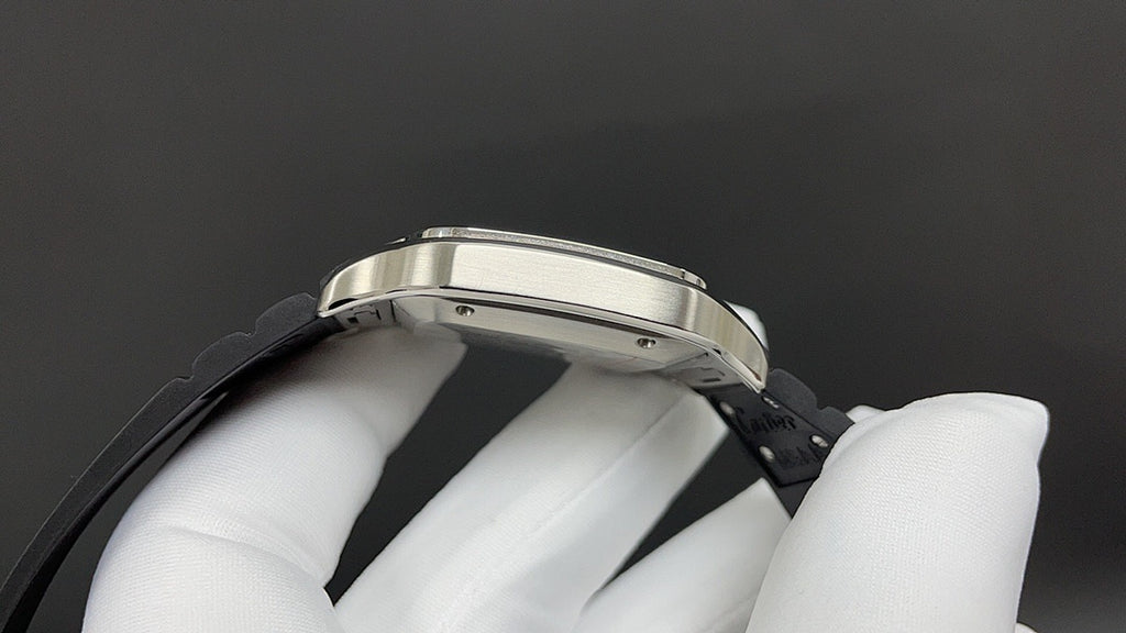 Cartier watch side profile with silver case edge and black leather strap.