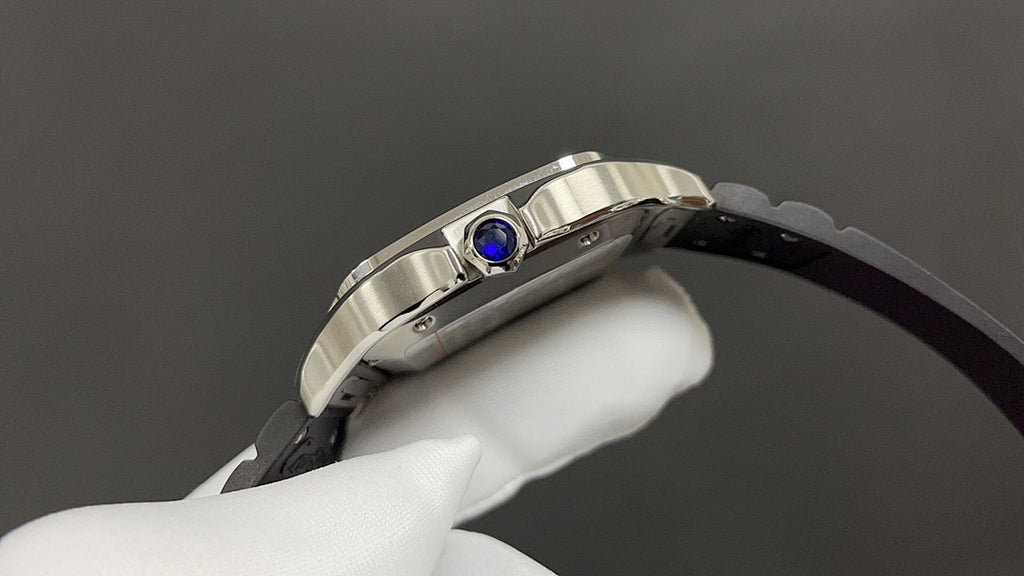 Cartier watch front-right view with blue crown detail and black leather strap.