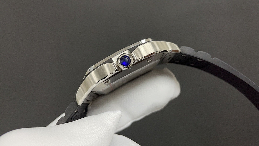 Cartier watch front-right view with blue crown detail and black leather strap.
