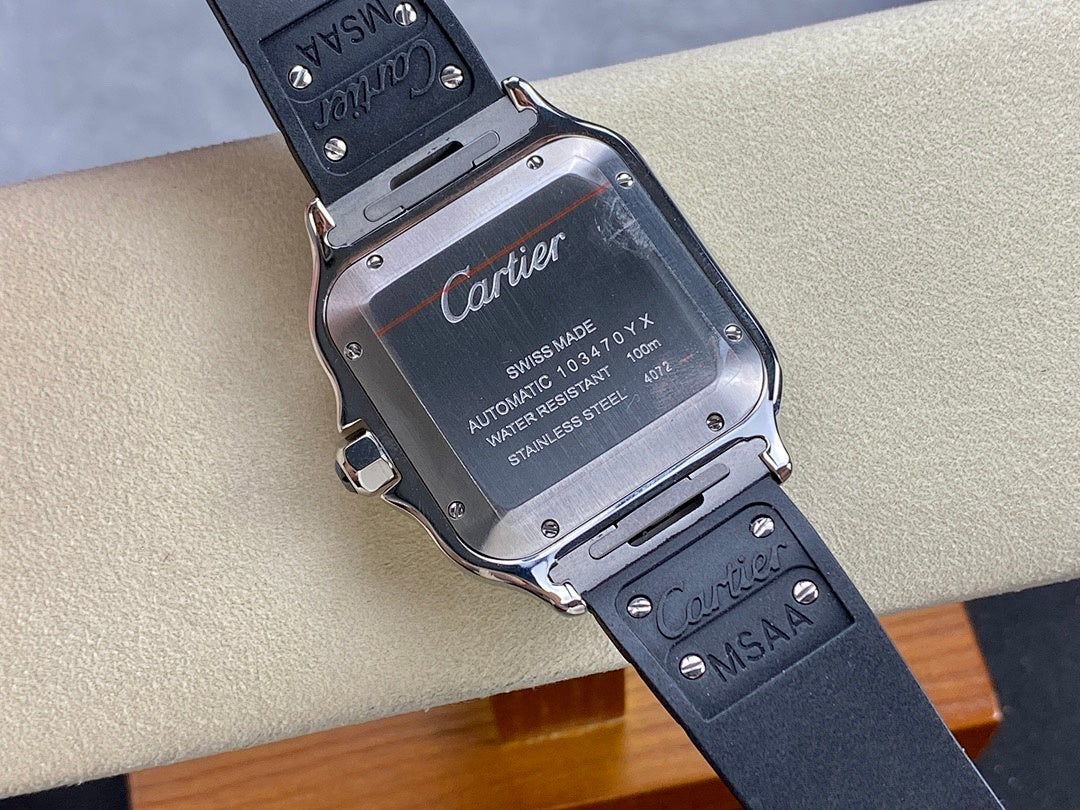 Cartier watch caseback with engraved text and black rubber strap