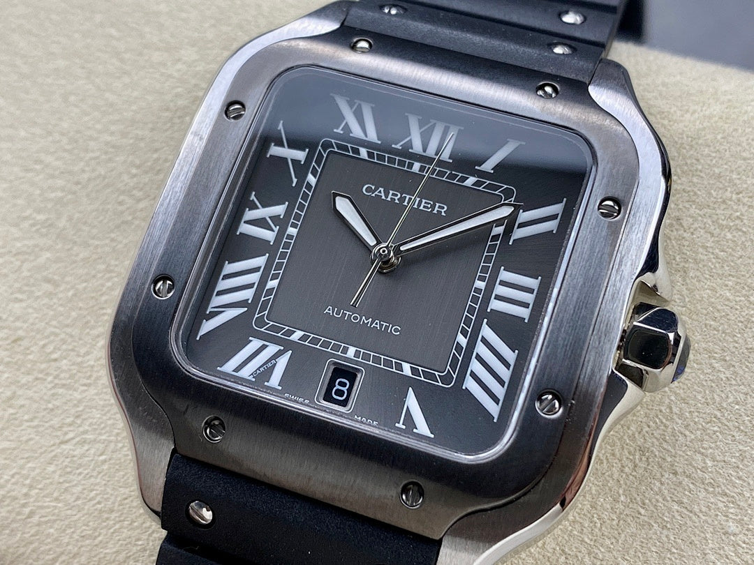 Cartier watch with black dial, Roman numerals, and black strap on stand