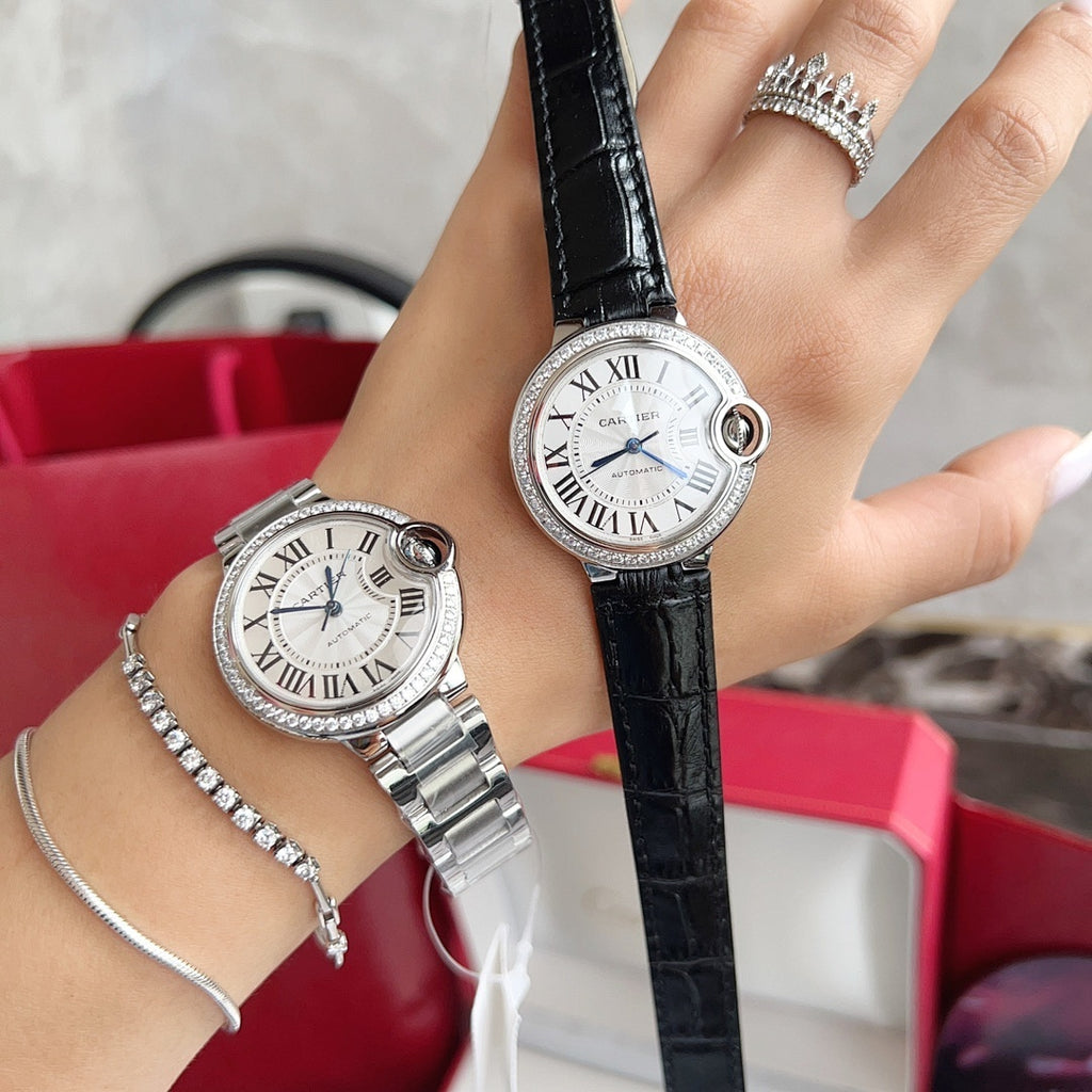 Cartier Ballon Bleu watches with black leather straps, white dials and diamond bezels