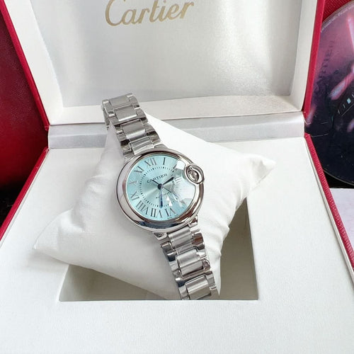 Cartier Ballon Bleu watch with light blue dial and silver link bracelet, wristwatch angle