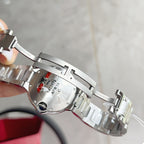 Cartier Ballon Bleu watch caseback with stainless steel bracelet, close-up