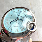 Cartier Ballon Bleu watch with light blue dial and Roman numerals, front close-up