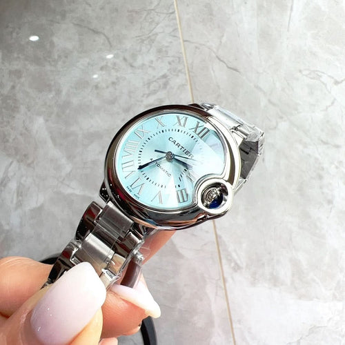 Cartier Ballon Bleu watch with light blue dial and silver link bracelet