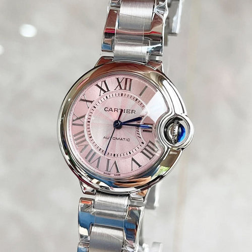 Stainless steel Cartier watch with pink dial, Roman numerals, blue cabochon crown