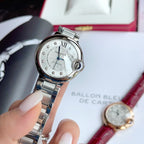 Cartier Ballon Bleu stainless steel wristwatch, silver dial, Roman numerals, blue hands