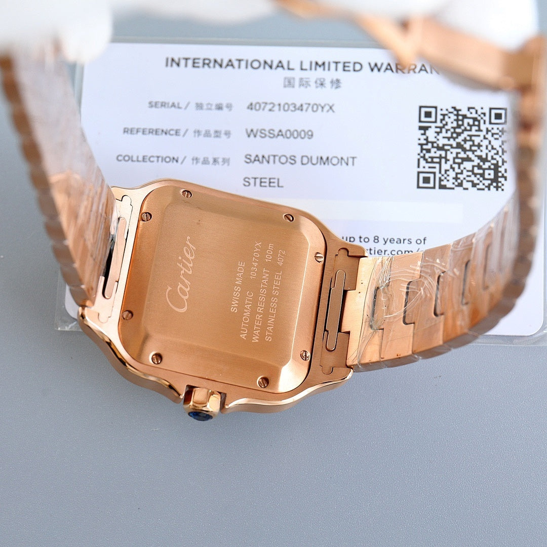 Rose-gold watch case back with engraved square panel and visible mounting screws