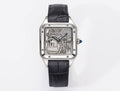 Cartier skeleton watch with silver case and black leather strap, clear see-through dial