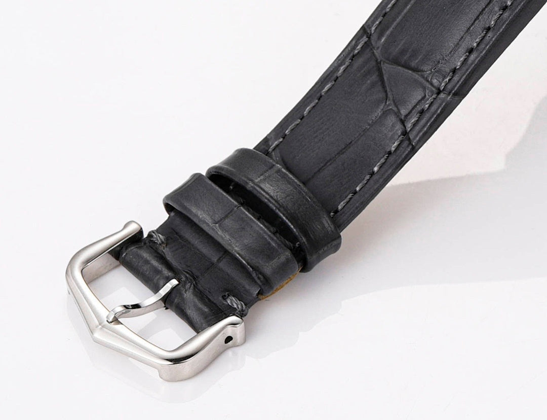 Cartier skeleton watch leather strap with silver buckle and stitched black band end
