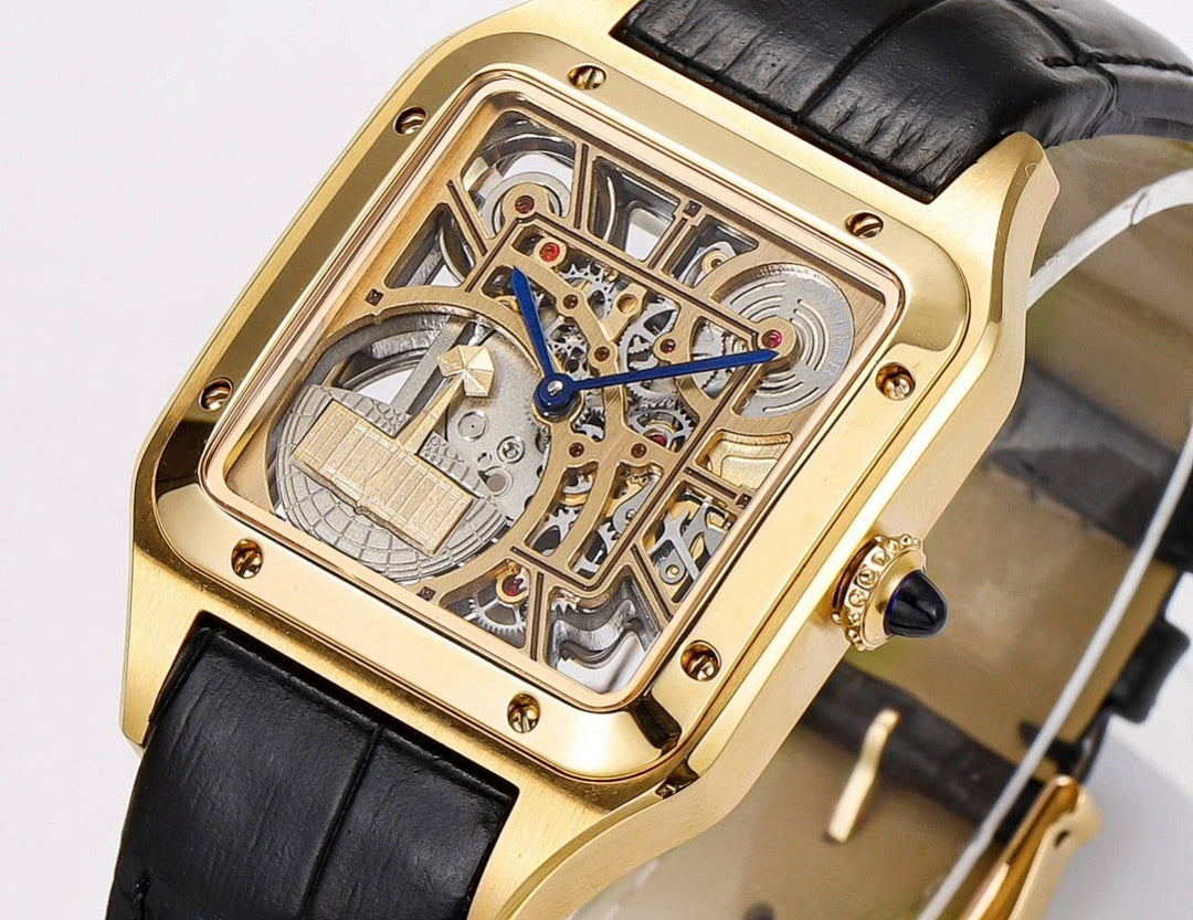 Close view of gold-tone skeleton dial with blue hands and black leather strap