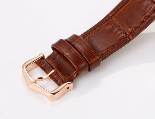 Cartier watch brown leather strap with gold-tone buckle, side profile