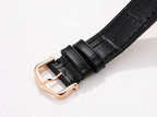 Cartier watch black leather strap with rose-gold buckle, square case edge.