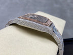 Cartier watch top side view with diamond bezel and textured blue dial