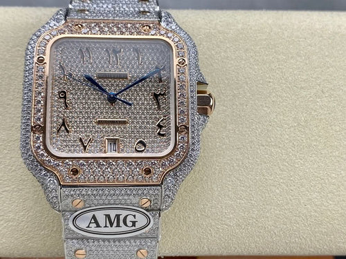 Square diamond watch with blue dial, ornate gold-tone bezel, and silver bracelet