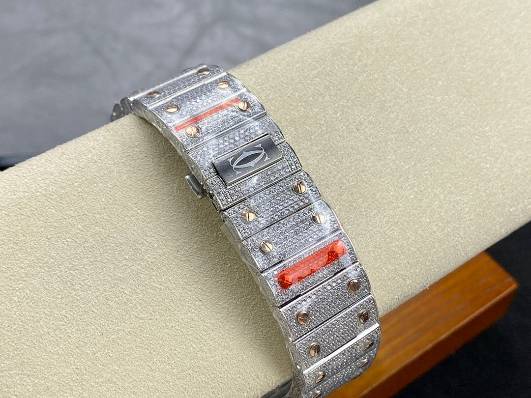 Silver diamond watch with red inset on the bracelet clasp and rectangular crown side