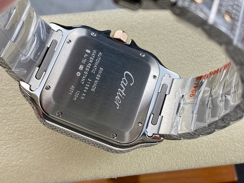 Back of diamond watch with engraved metal case and links on silver bracelet