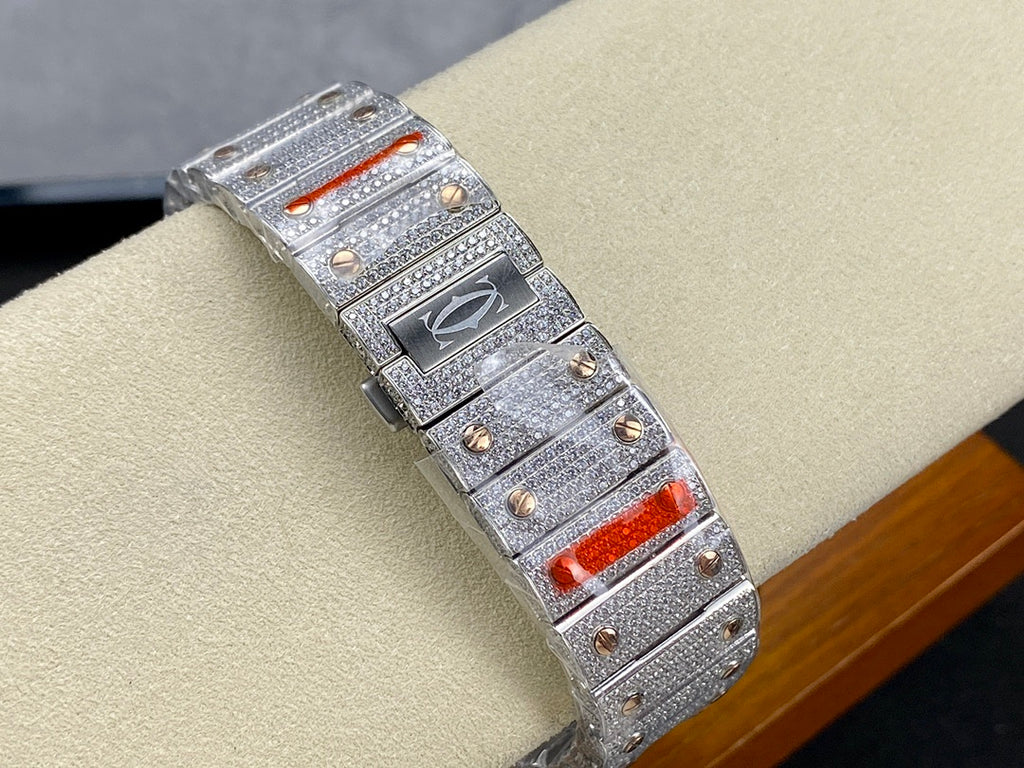 Silver diamond-set wristwatch bracelet with red insets and textured bezel detail