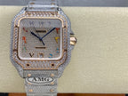 Diamond-set square wristwatch with silver strap, blue hands, and multicolor hour markers