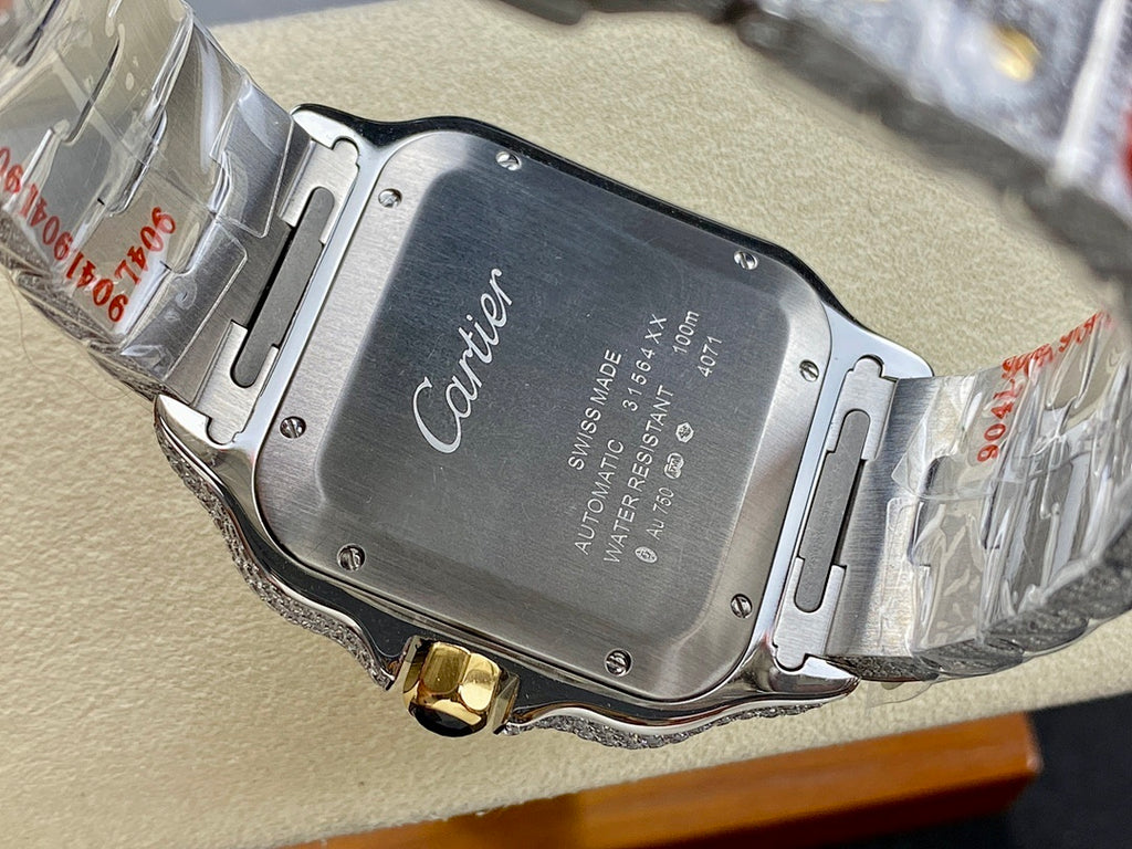 Cartier watch caseback showing Cartier logo on brushed metal back, silver bracelet links