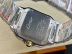 Cartier watch caseback showing Cartier logo on brushed metal back, silver bracelet links