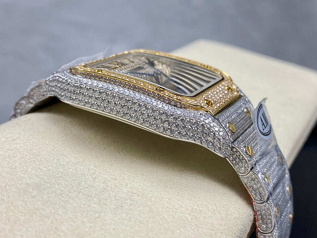 Cartier watch side view with gold-trimmed bezel and textured silver case, diamond details