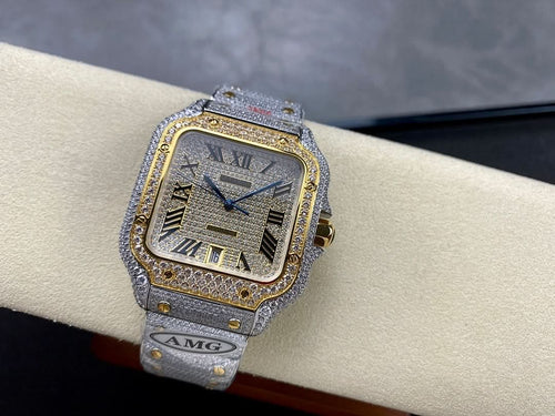 Cartier watch with glittery silver strap, gold bezel, blue hands, Roman numerals and square dial