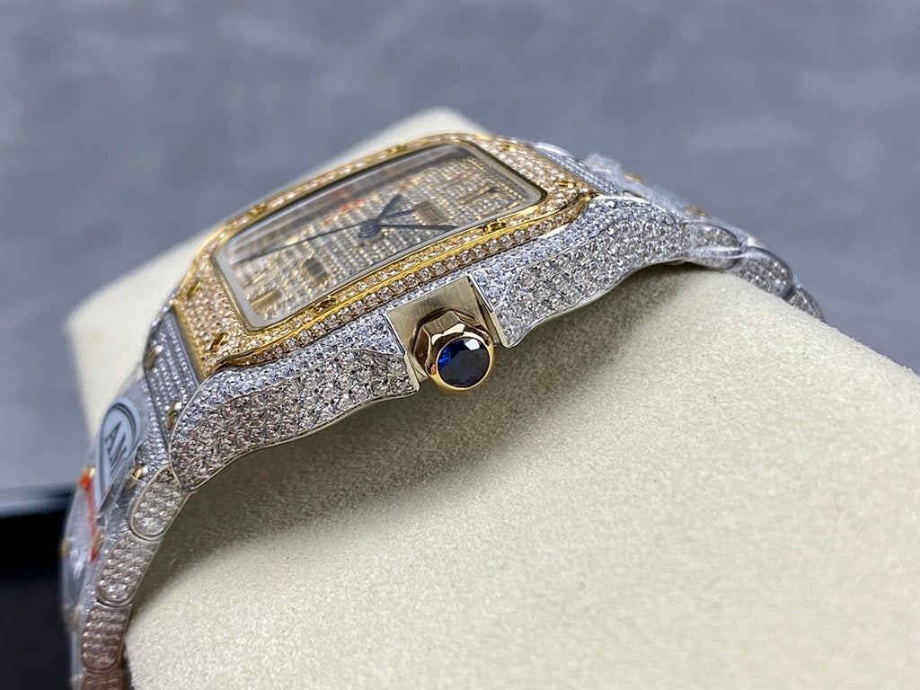 Diamond-studded watch with gold-toned bezel and crown, blue dial, light gray strap