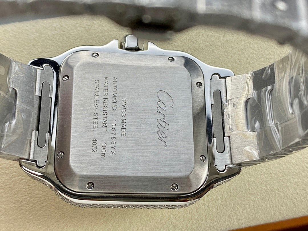 Cartier watch case back on bracelet, engraved markings visible