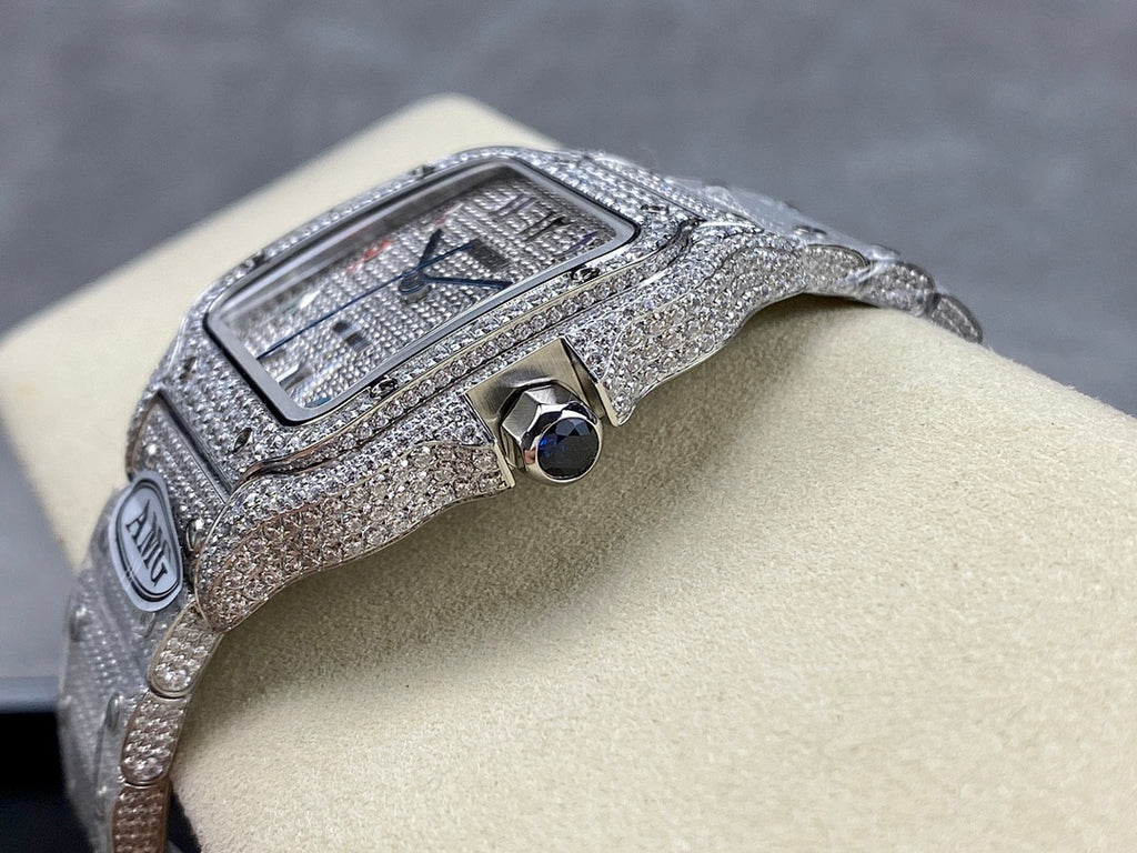 Cartier watch with jeweled rectangular face and silver strap, AMG accent plate, side crown