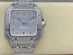 Cartier square watch with jeweled silver-tone frame, blue dial with Roman numerals, AMG logo.