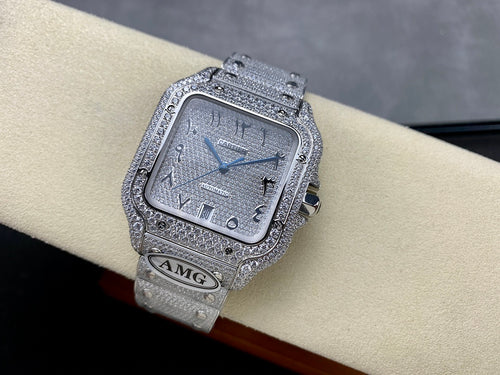 Cartier watch with diamond-studded silver-tone case, blue dial, leather/metal strap, clasp.