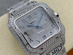 Cartier watch close-up with blue dial, diamond-studded frame, AMG logo on bracelet link.